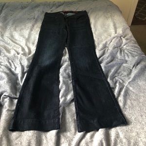 Very dark flare blue jeans. Sketchy